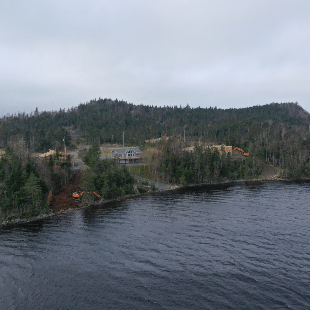 land being cleared around a pond