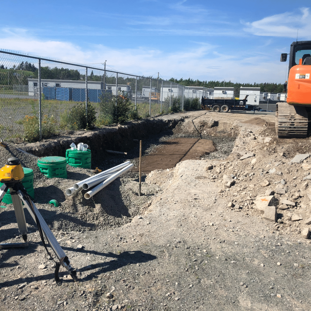 working on a septic system with filled dirt